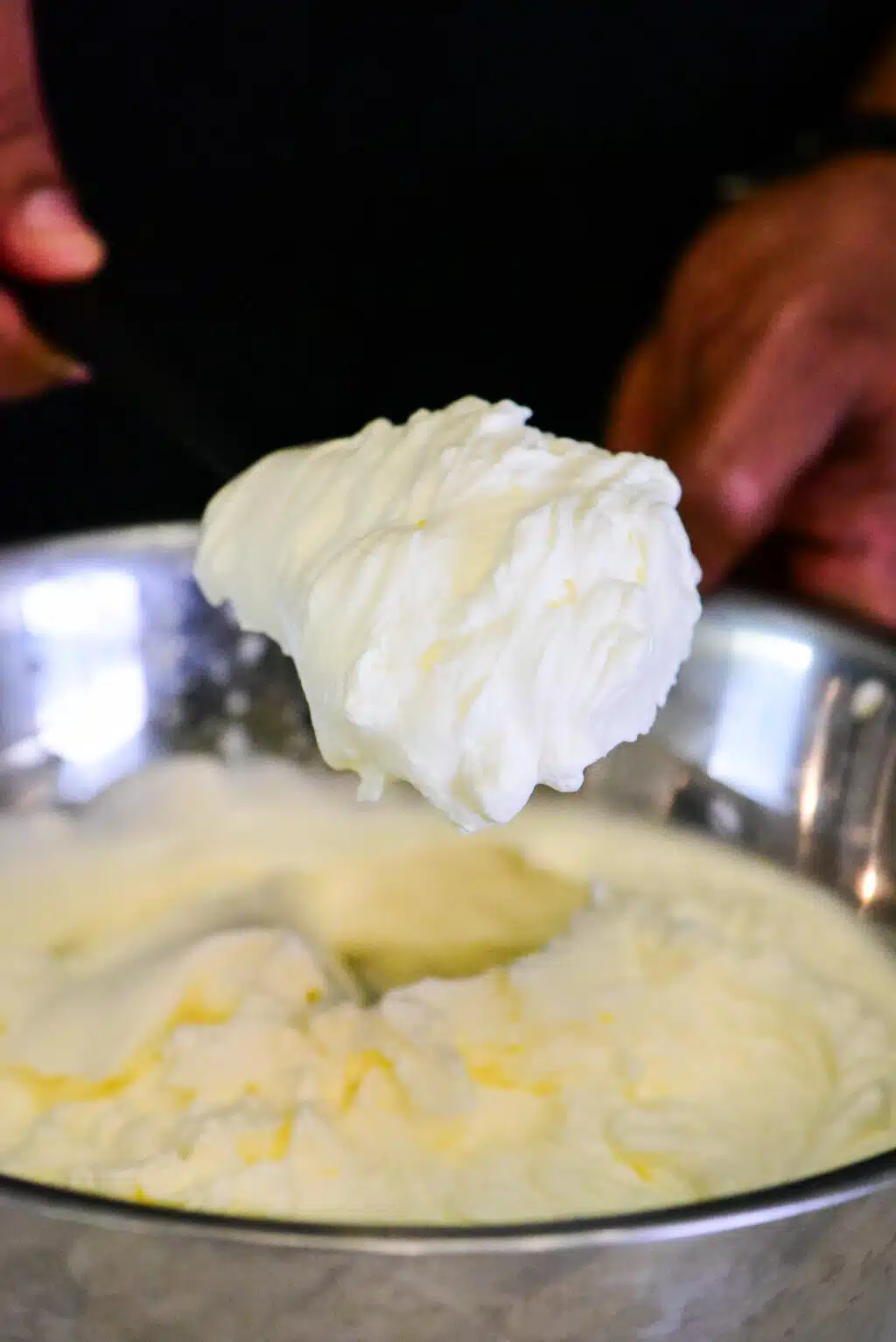 whipping heavy whipping cream until stiff peaks form