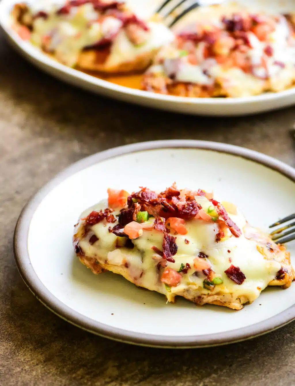 single serving of Monterey chicken on a white plate