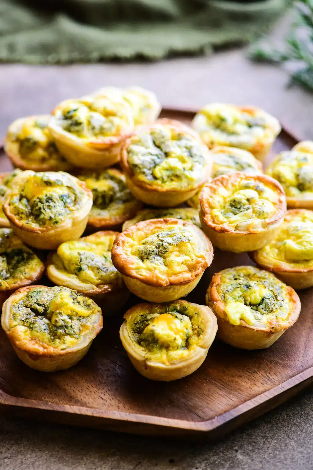 large serving tray full of mini quiche