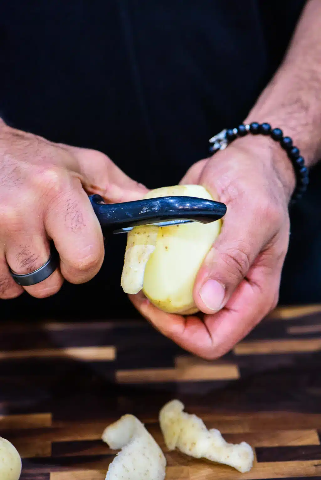 peeling Yukon Gold potatoes