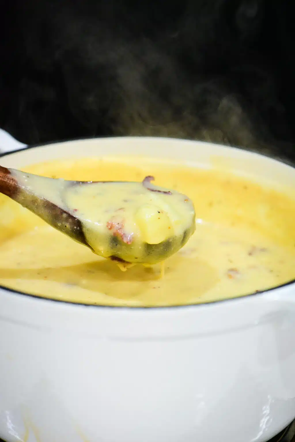 cooking baked potato soup on the stove