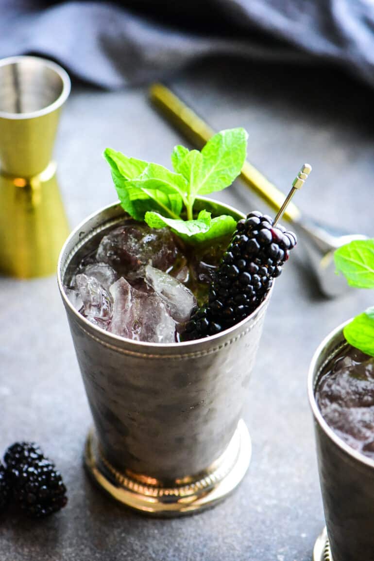 blackberry mint julep in a frosted julep cup