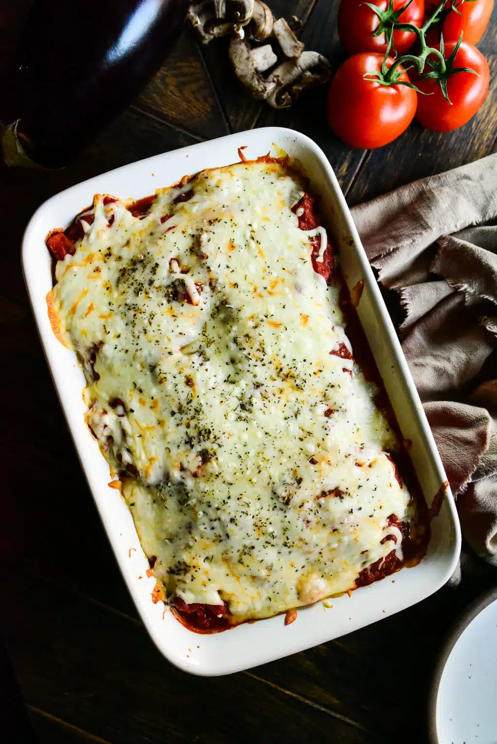overhead shot of baked lasagna in a casserole dish