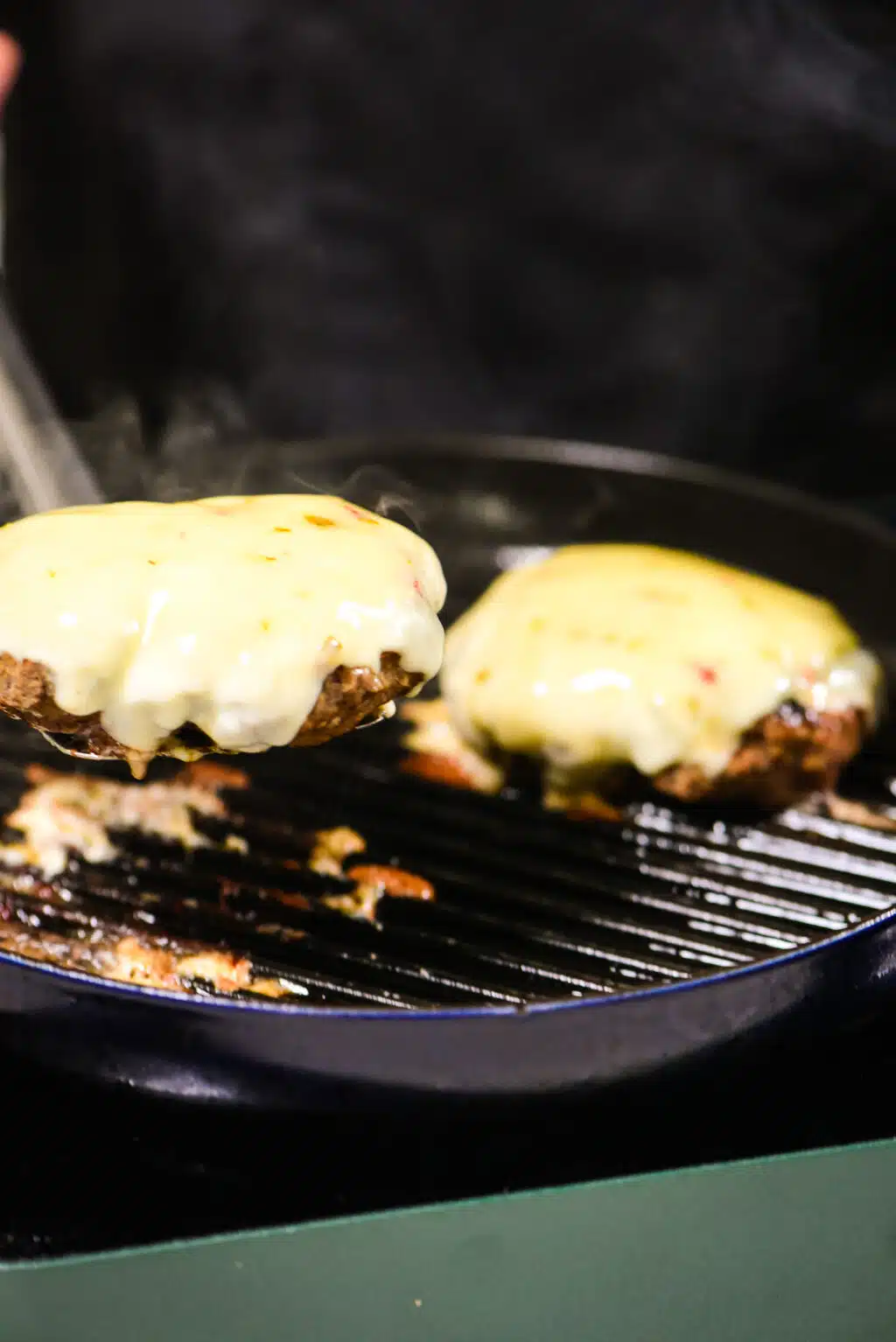 grilling the cheeseburgers