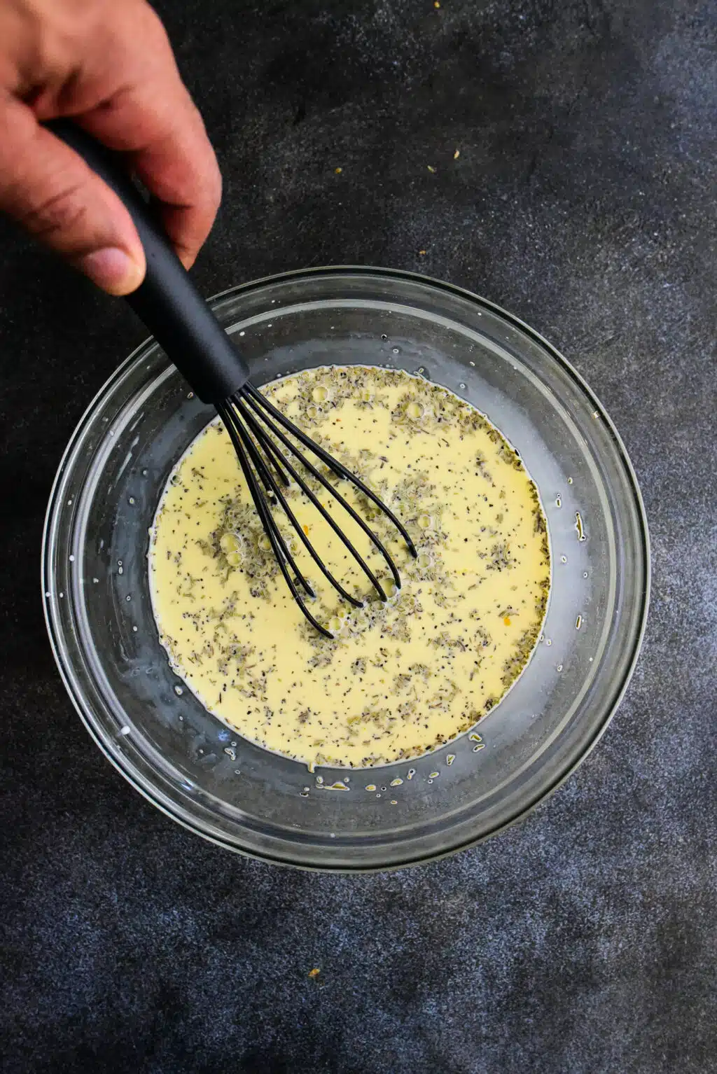 making the custard for the croissant bake