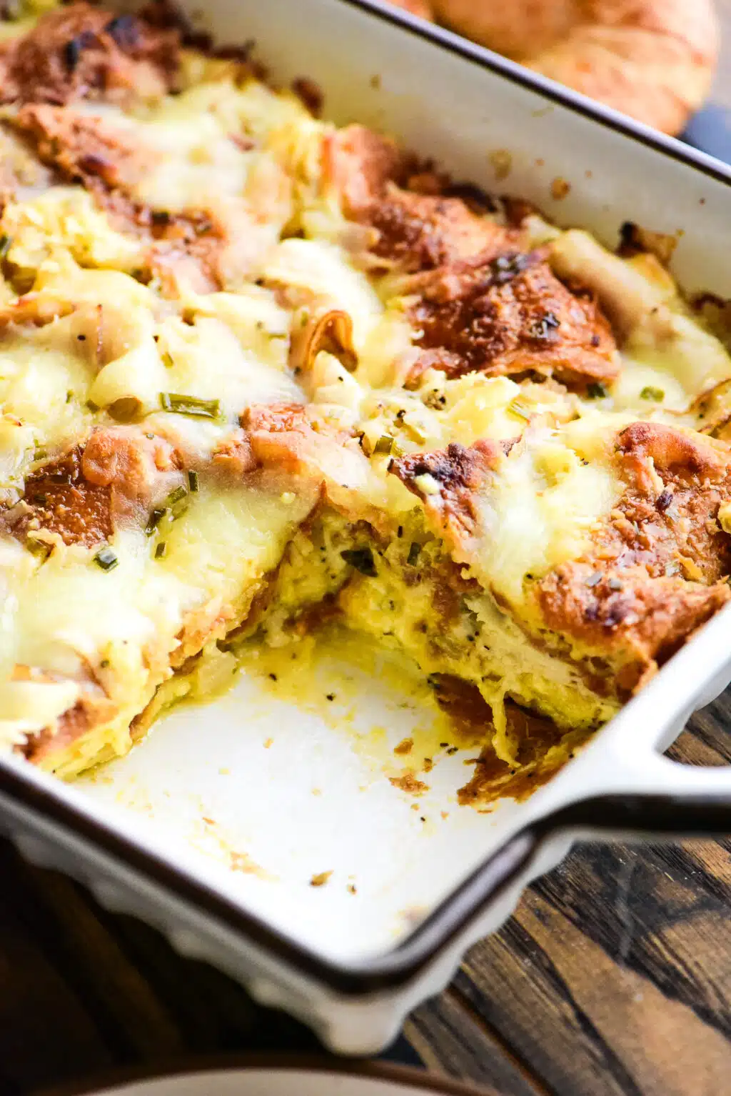turkey and cheese croissant casserole with a portion removed