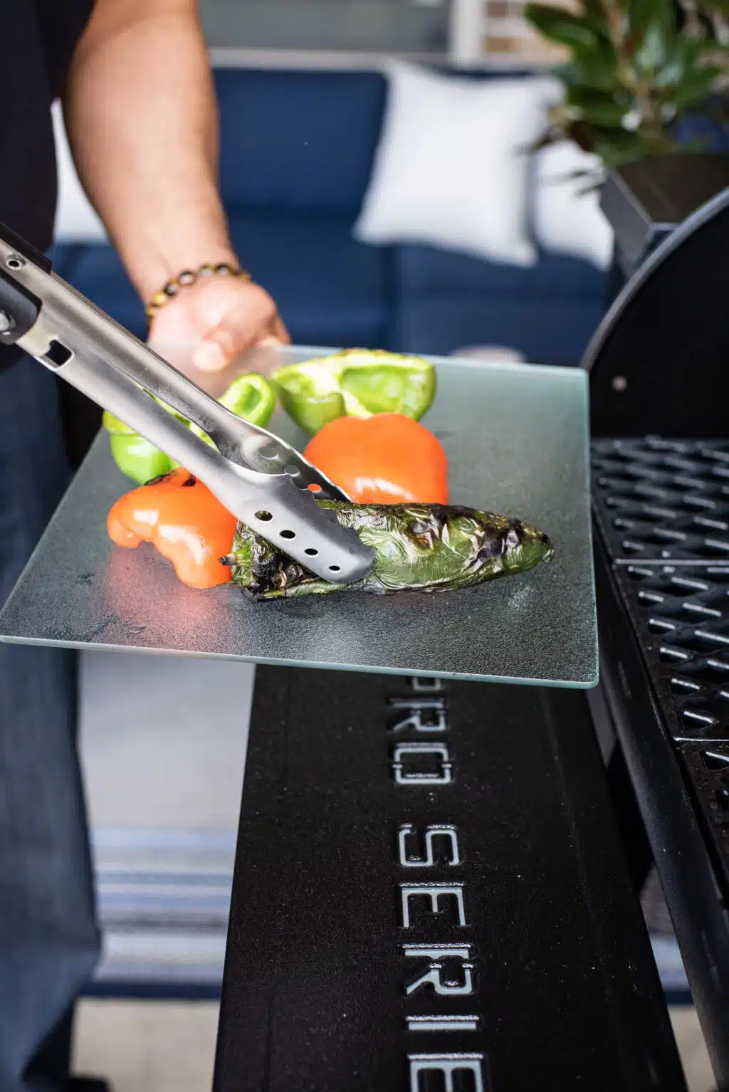 Charring the peppers on the grill