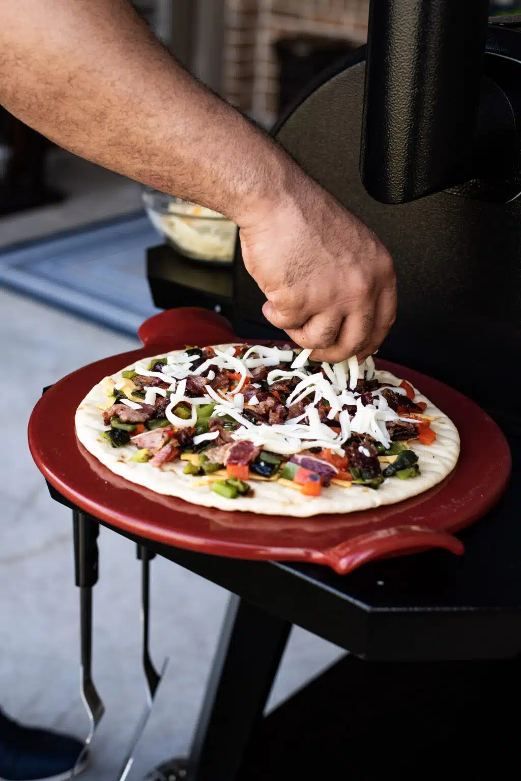 Building the grilled breakfast pizza