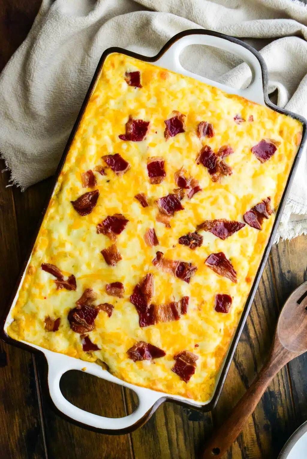 overhead shot of beef bacon mac and cheese in a large casserole dish