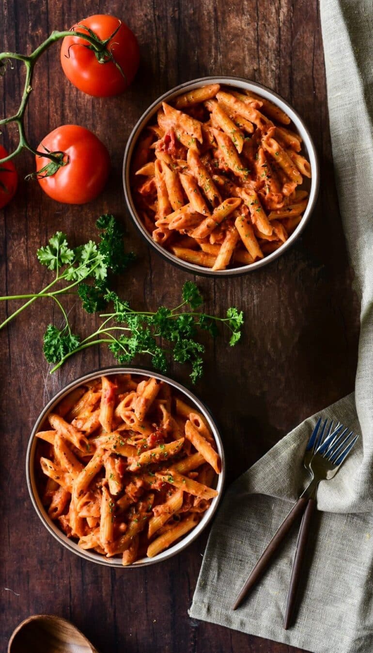 overheard shot of two bowls of easy Simple Penne alla Vodka