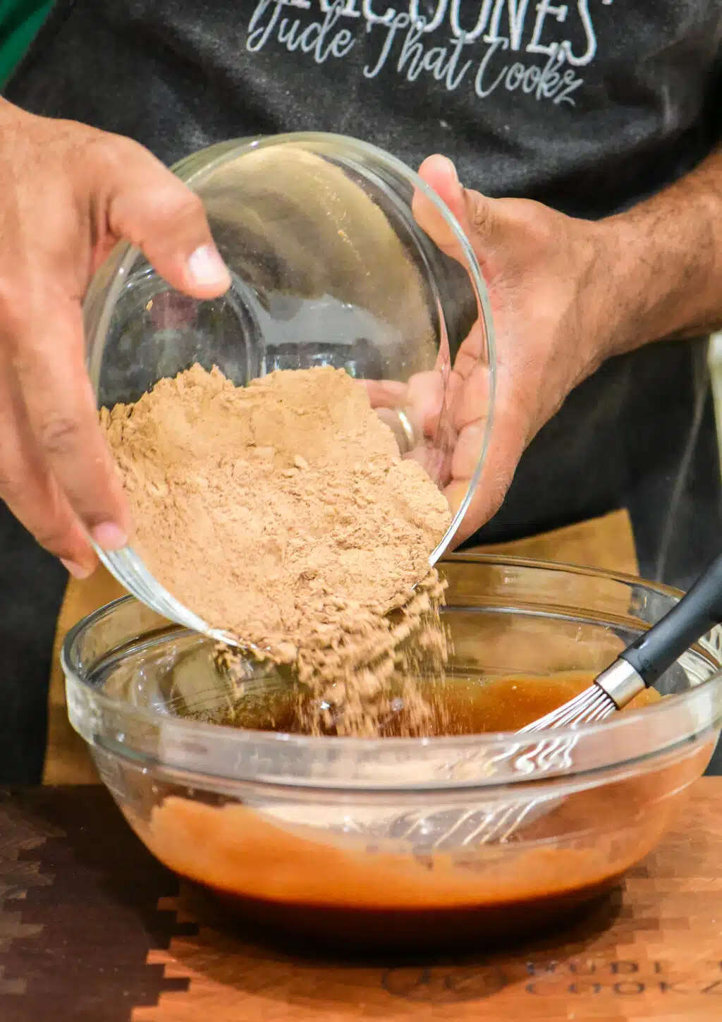 adding cocoa to the brownie's chocolate base