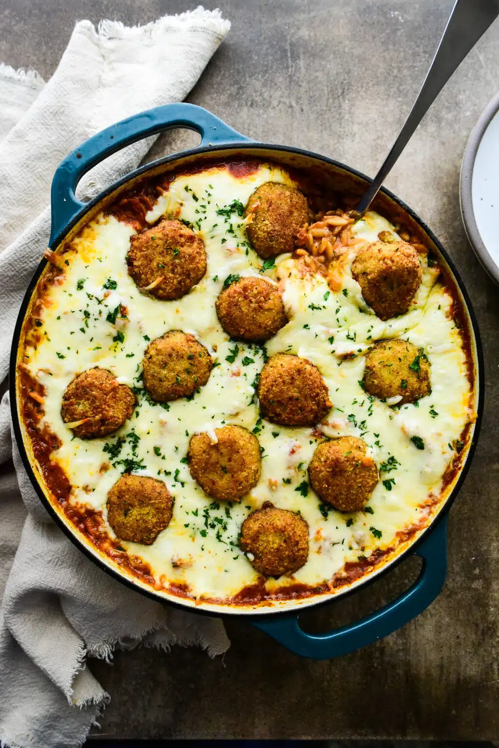 overhead shot of chicken parm meatball orzo just out of the oven