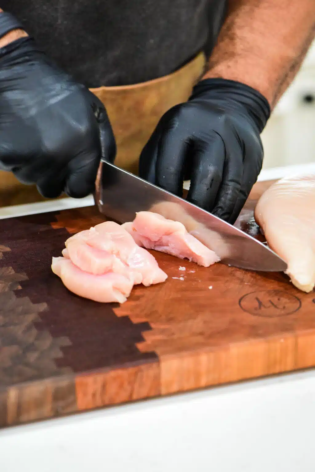 chopping the chicken breasts