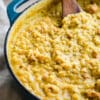 close-up of oven-baked chicken and herb risotto in a large saucepan